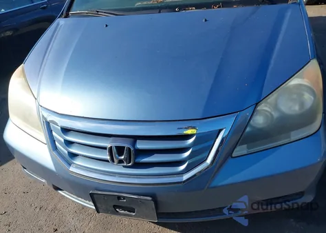 2010 Honda Odyssey Lx z USA, uszkodzony, nr VIN 5FNRL3H26AB005180